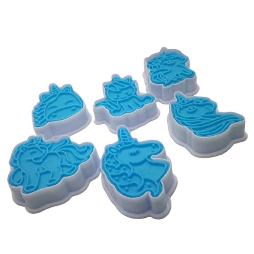 Cookie cutters and unicorn shaped cookie markers