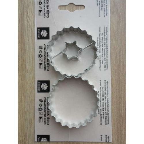 Set of pastry cutters - large fluted circles with a center.